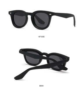 Polarized round sunglasses in matte black with silver diamond rivets from multiple angles
