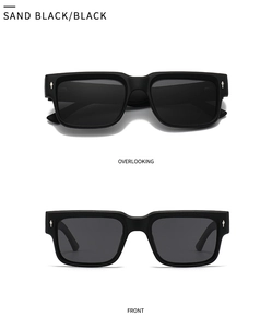 Detail view of square sand black polarized sunglasses with silver diamond accents