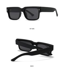 Detail view of matte black square polarized sunglasses with silver rivets and wide temples