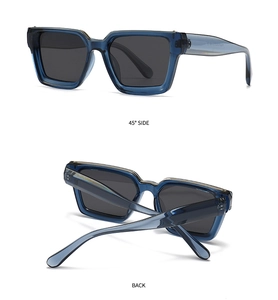 Detail view of square blue transparent sunglasses frame with dark grey polarized lenses