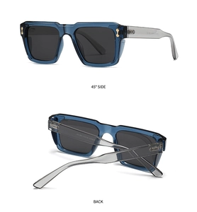 Detail view of square polarized sunglasses with blue frames and metal-reinforced temples