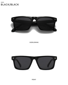 Detail view of black square polarized sunglasses with silver hinge accents and metal decor