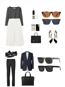 Flat lay of polarized sunglasses styled with professional business and elegant outfits