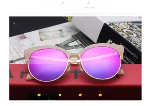Macro view of oversized beige sunglasses frame showing model Y9936 and size parameters