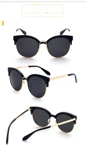 Three-view layout of black cat-eye sunglasses with gold metal accents and dark lenses