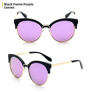 Detailed view of cat-eye sunglasses with purple lenses and gold metal accents