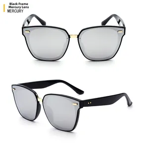Detail of polarized oversized sunglasses with black TR frames and silver mercury lenses