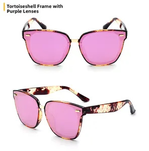 Close-up of tortoise shell polarized sunglasses with purple lenses and gold accents