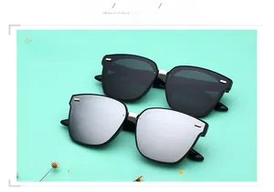 Detail of high-quality TR polarized sunglasses with black frames and silver mirror lenses