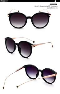 Detail view of round oversized sunglasses with gradient lenses and slim metallic gold arms