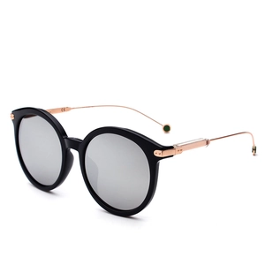 Classic aviator sunglasses with black frames, silver mirrored lenses, and gold metal temples