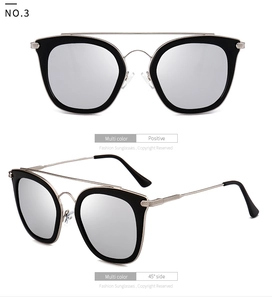 Polarisierte Sonnenbrille mit schwarzem Rundrahmen, goldener Brücke und silbernen Spiegelgläsern