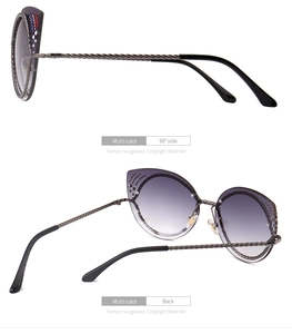 Detailweergave van de cat-eye zonnebril met kleurverloopglazen en gedraaide metalen pootjes