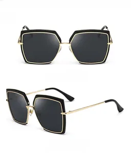 Front and 45-degree side views of square oversized sunglasses with gold metal trim