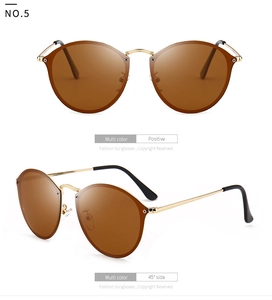 Klassische polarisierte Sonnenbrille mit braunen Verlaufsgläsern und Goldmetallrahmen