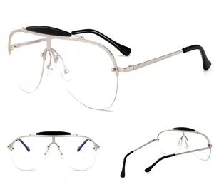 Three-view detail of oversized aviator sunglasses with gold frames and black brow bar