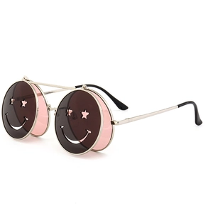 Lunettes de soleil steampunk avec monture en métal argenté et design découpé de visage souriant