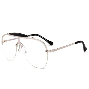 Silver metal oversized aviator sunglasses with integrated bridge and clear lenses