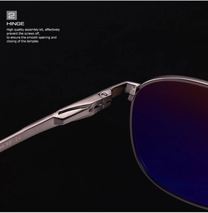 Close-up of the durable metal hinge and precision screw on classic polarized sunglasses