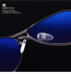 Detail of adjustable silicone nose pads on classic pilot polarized sunglasses