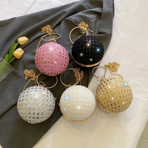 Sparkling spherical evening clutch bags with rhinestones and chain straps in five colors