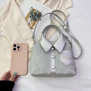 Silver creative shirt-shaped handbag with adjustable shoulder strap and metallic finish