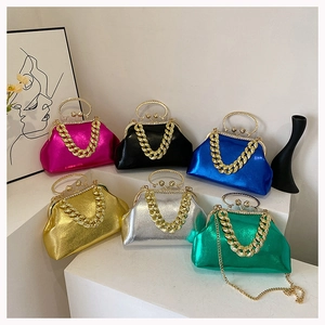 Collection of metallic candy-colored evening bags with chunky chains and ring handles