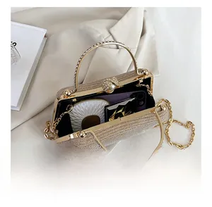 Internal view of evening rhinestone clutch bag showing storage space for phone and makeup
