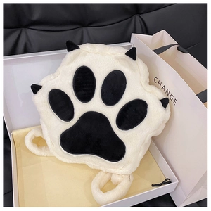 Detail of plush cat paw backpack showing thick fluffy faux fur and stereoscopic 3D claws