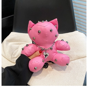 Pink cartoon cat-shaped PU leather bag featuring silver cone studs and heart charm chain