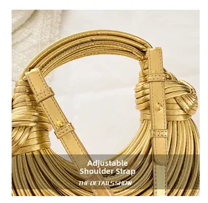 Detail of adjustable shoulder strap and gold metallic knotted woven bag craftsmanship