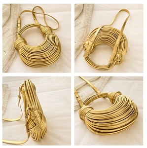 Detailed views of gold sculptural woven handbag with metallic tubular knots and shoulder strap