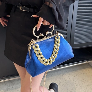 Royal blue glossy evening bag with gold chain strap and vintage metal handle decor
