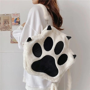 Plush cat paw backpack in white faux fur with black claw detail for women