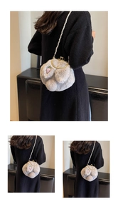 Detail showing plush rabbit bag with pink carrot embroidery and pearl chain strap