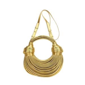 Unique gold hand-woven knot shoulder bag with metallic texture and adjustable strap