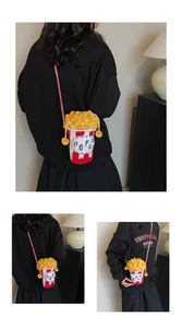 Creative popcorn bucket knitted crossbody bag with red stripes and pom-pom details