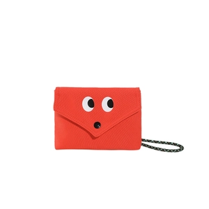 Petit sac carré rouge avec motif grands yeux et bandoulière tissée verte