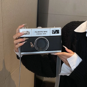 Creative camera-shaped crossbody bag with silver and black metallic leather patchwork