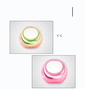 Close-up of translucent acrylic dumpling bag rings in iridescent and pink gradient colors