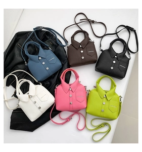Flat lay of creative shirt-shaped crossbody bags in multiple colors with rivet details