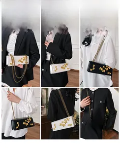 Fashionable crossbody bag with golden butterfly detail shown on models in black and white