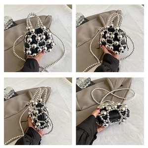 Detail shots of black mini bucket bag with silver metal beads and beaded handle