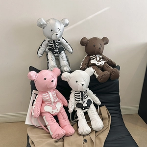 Gothic skull bear backpacks in silver, brown, pink, and white faux leather finish
