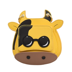 Mini cartoon cow crossbody bag with yellow leather finish and chain strap for summer