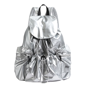 Metallic silver pleated backpack with drawstring closure and large capacity main compartment