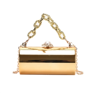 Chic gold cylindrical acrylic evening clutch with pearl clasp and chunky chain strap