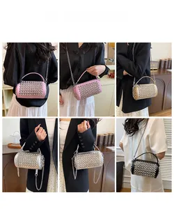 Multi-angle view of sparkling rhinestone cylinder bag with metallic chain strap and handles