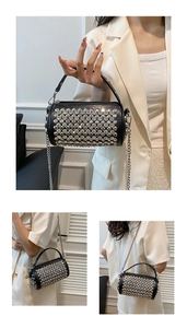 Three-way view of a black studded cylinder handbag with sparkling silver rhinestones