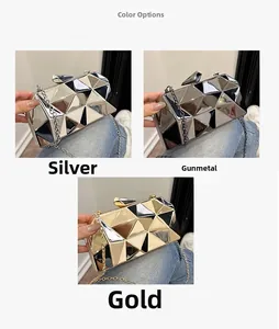 Three metallic geometric clutch bags in silver, gunmetal, and gold with chain straps